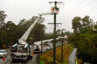 Electricity distributor, Energex crew work to fix powerlines on Buderim-Mooloolaba Road on the Sunshine Coast, Wednesday, Aug. 22, 2007. 7,700 homes were without power today mostly in areas of the Sunshine Coast and Brisbane's north, although there were just over 800 homes blacked out at Bellbowrie in Brisbane's west. (AAP Image/Sunshine Coast Daily, Michaela Glen) NO ARCHIVING, NLOUT