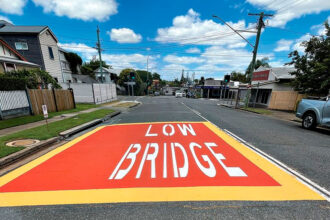 WARNING SIGN: The prominent road markings aim to reduce bridge strikes at Pine St.