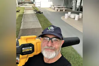 Cr Peter Mitchell was happy to help with the clean-up.