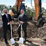 FOCUS ON CONSTRUCTION: Queensland Treasurer David Janetzki and the Minister for Housing and Public Works, Sam O’Connor, during a tour of a housing construction site.