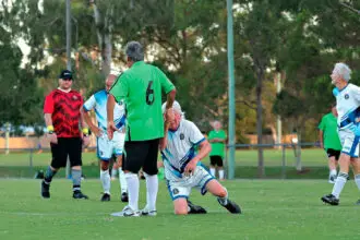 OLD BOYS: More than 1000 footballers and their families are expected this October when the Over-70s World Cup is staged in the Redlands. INSET: The official FIFA World Cup trophy for men.