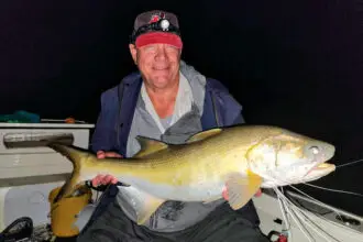 SURPRISE CATCH: A proud moment with a threadfin salmon caught in the Logan River.