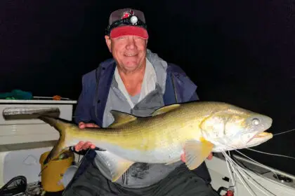 SURPRISE CATCH: A proud moment with a threadfin salmon caught in the Logan River.