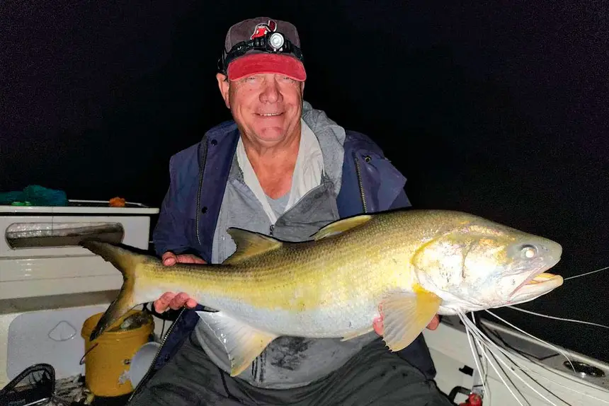 SURPRISE CATCH: A proud moment with a threadfin salmon caught in the Logan River.