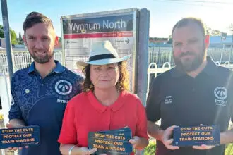 UNITED STAND: Lytton MP Joan Pease with rail workers at Wynnum North station.