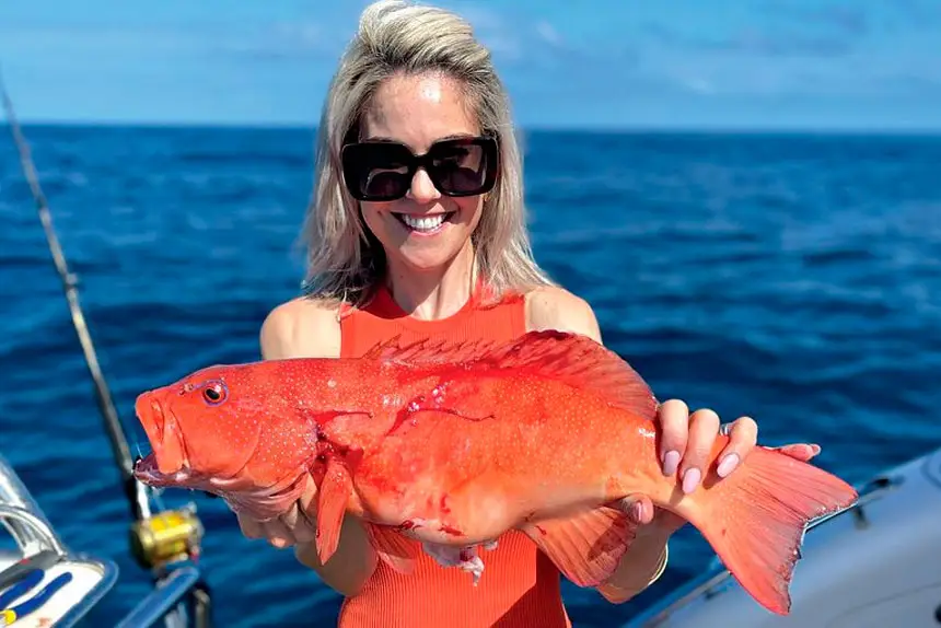 RED REWARD: Chelsea Loney with a prized catch.