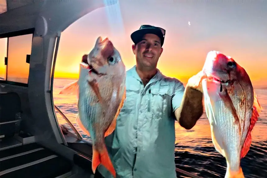 TWIN WIN: A proud Joe Di Salvo with two snapper he caught.
