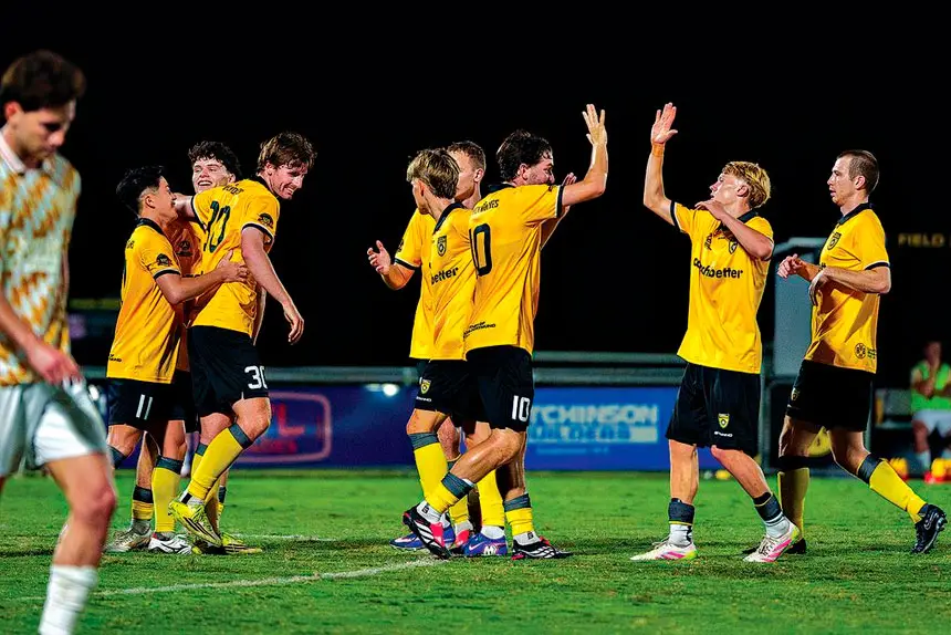 CUP WIN: Wolves celebrate their winning goal against Moreton City.
