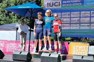Ann O’Brien celebrates on the Tour de Brisbane podium.