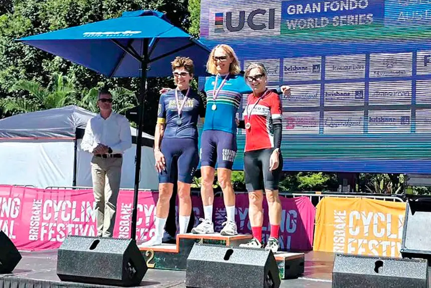 Ann O’Brien celebrates on the Tour de Brisbane podium.