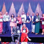 WINNING SMILES: Last year’s winners.