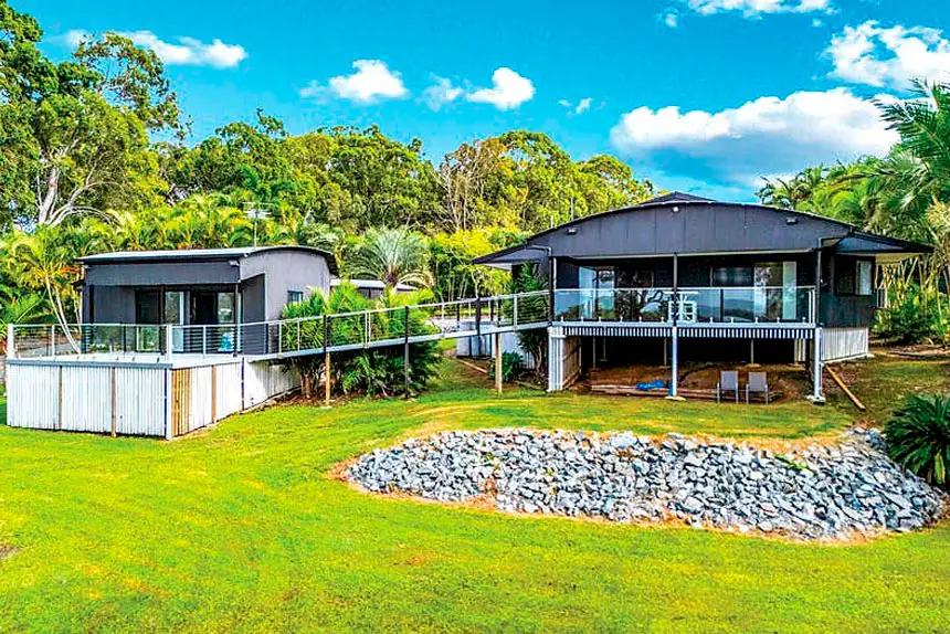 EXTENSIVE VIEWS: The property offers sweeping bay views towards North Stradbroke Island and beyond.