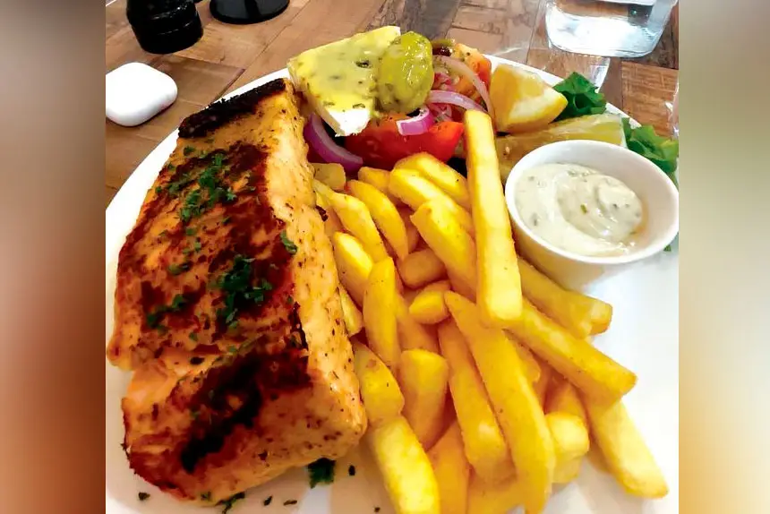 Grilled salmon, chips and Greek salad from Sea Fuel.