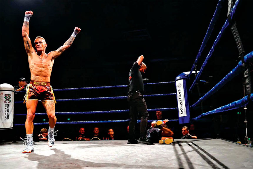 QUICK FINISH: Brad Walton celebrates his 44-second stoppage