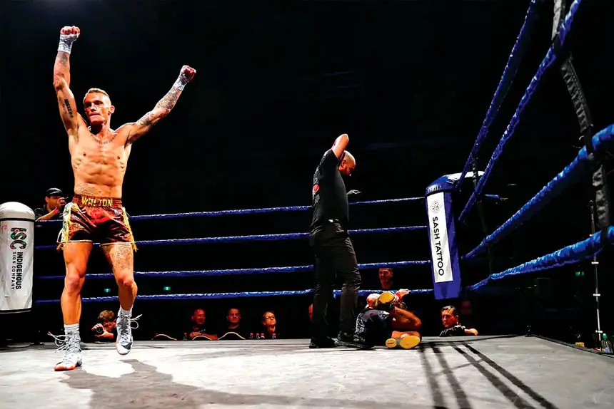 QUICK FINISH: Brad Walton celebrates his 44-second stoppage