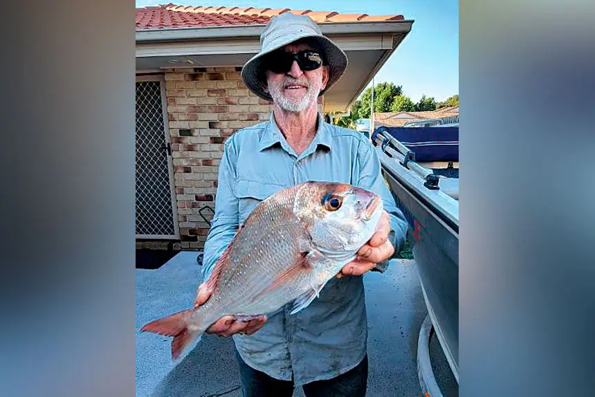 Ron Ruhland with a prize snapper at Coochiemudlo Island.