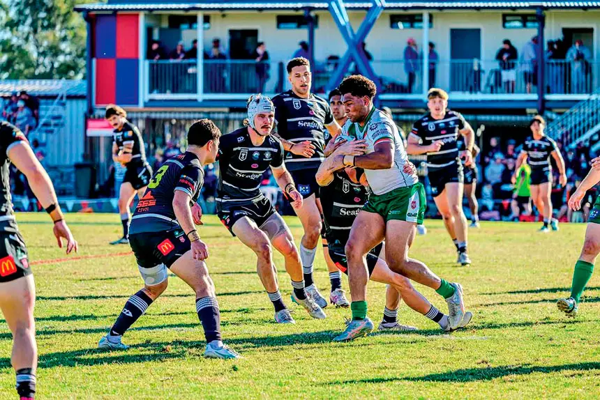 TOO STRONG: Hat-trick hero Jamal Shibasaki takes on the Tweed defensive line.