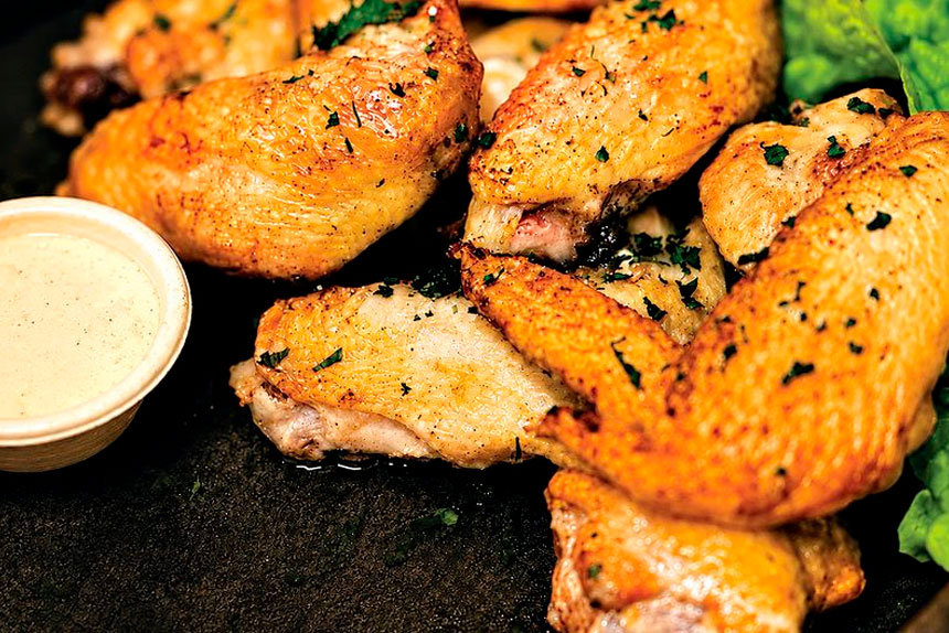FLYING HIGH: Craft Brewhouse’s oven-baked lemon and pepper chicken wings.