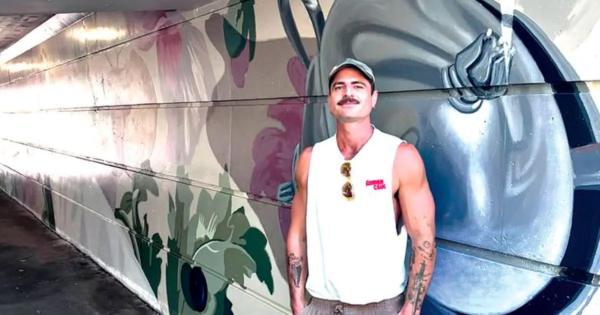 Jarad Danby with his first Brisbane public art mural.