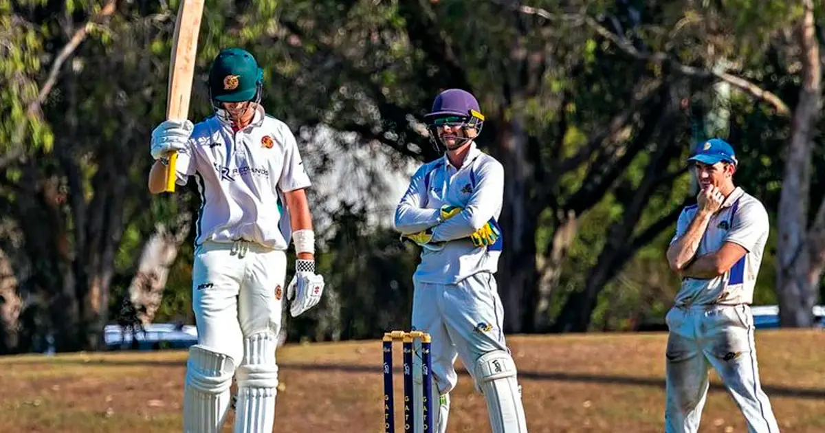 TOP KNOCK: Liam Smith celebrates 50 runs for Redlands-Tigers in their win over Sunshine Coast. PHOTO: Doug O’Neill